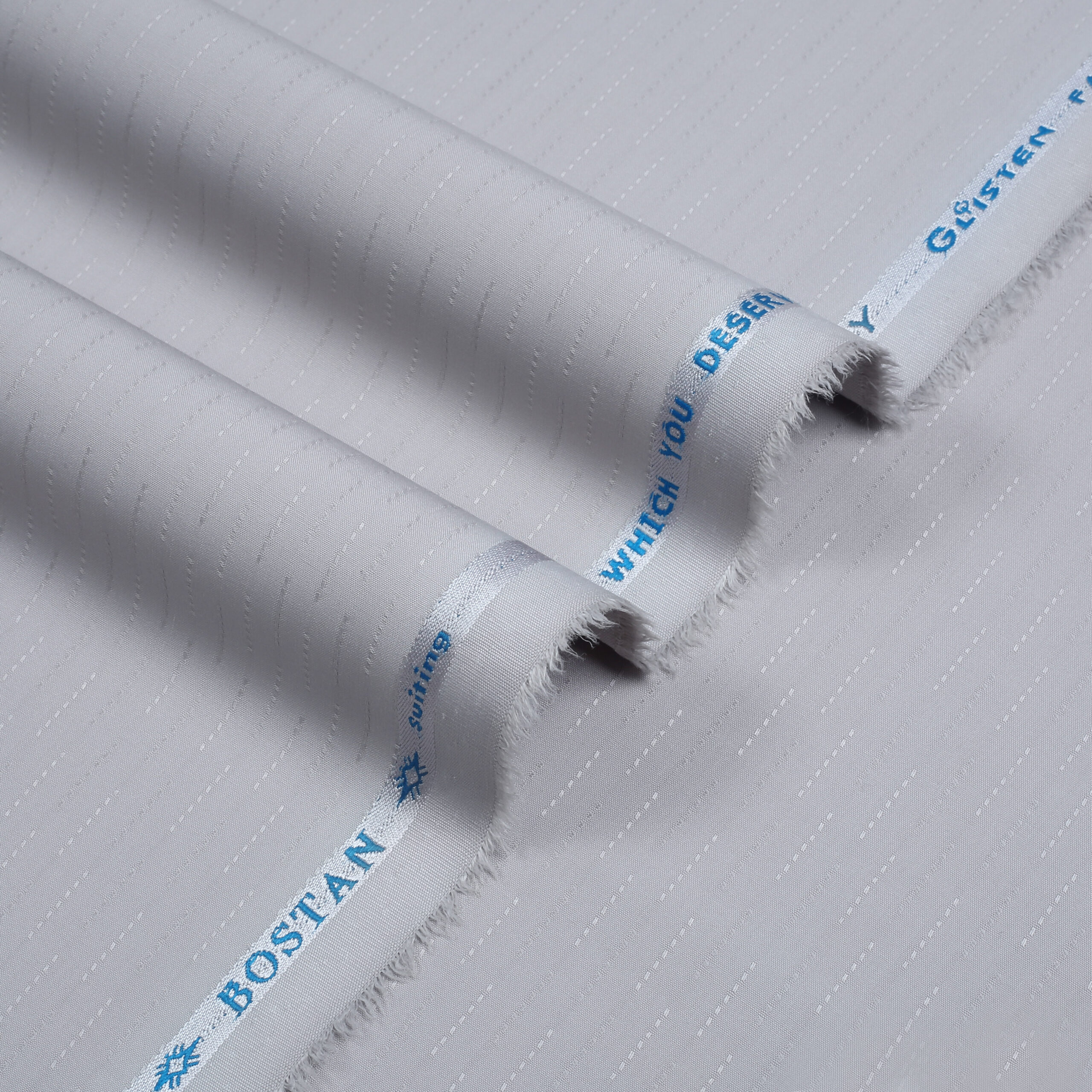 Elevate Your Wardrobe with Premium Suiting Fabrics from Glisten Fabrics